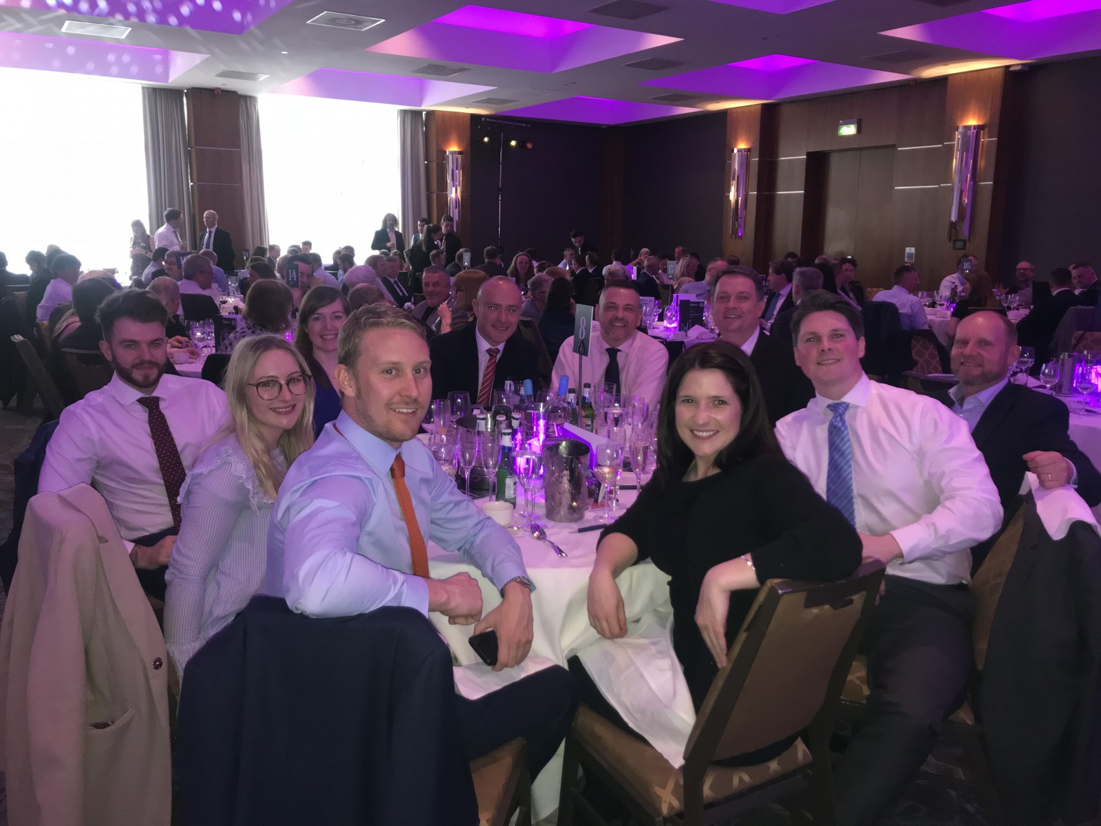 Rees Allan, Matthew Gilchrist, and Nick Grayston pictured with surveying clients at the RICS Annual Dinner in Edinburgh