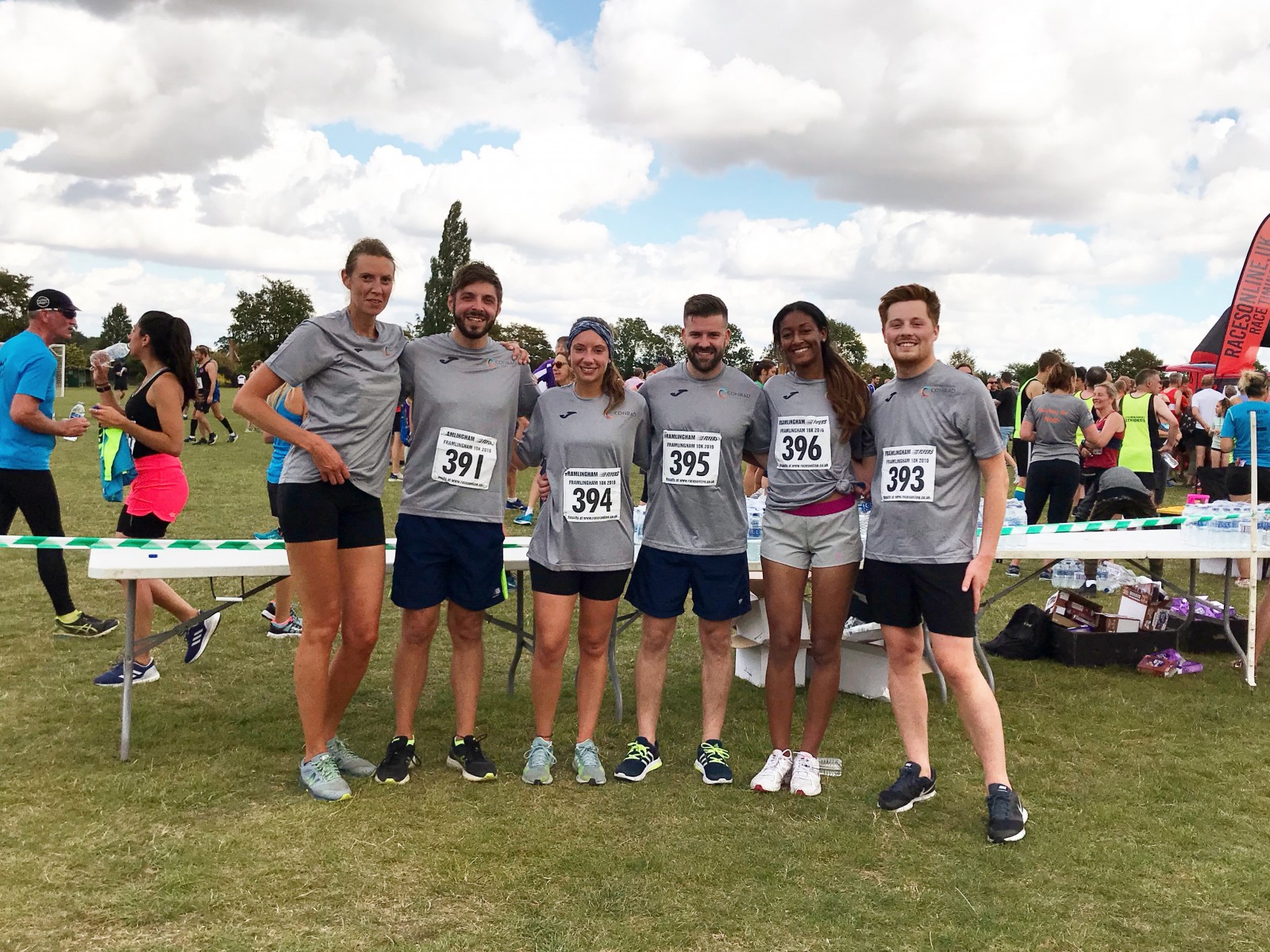 Group photo of Conrad runners after the 10k