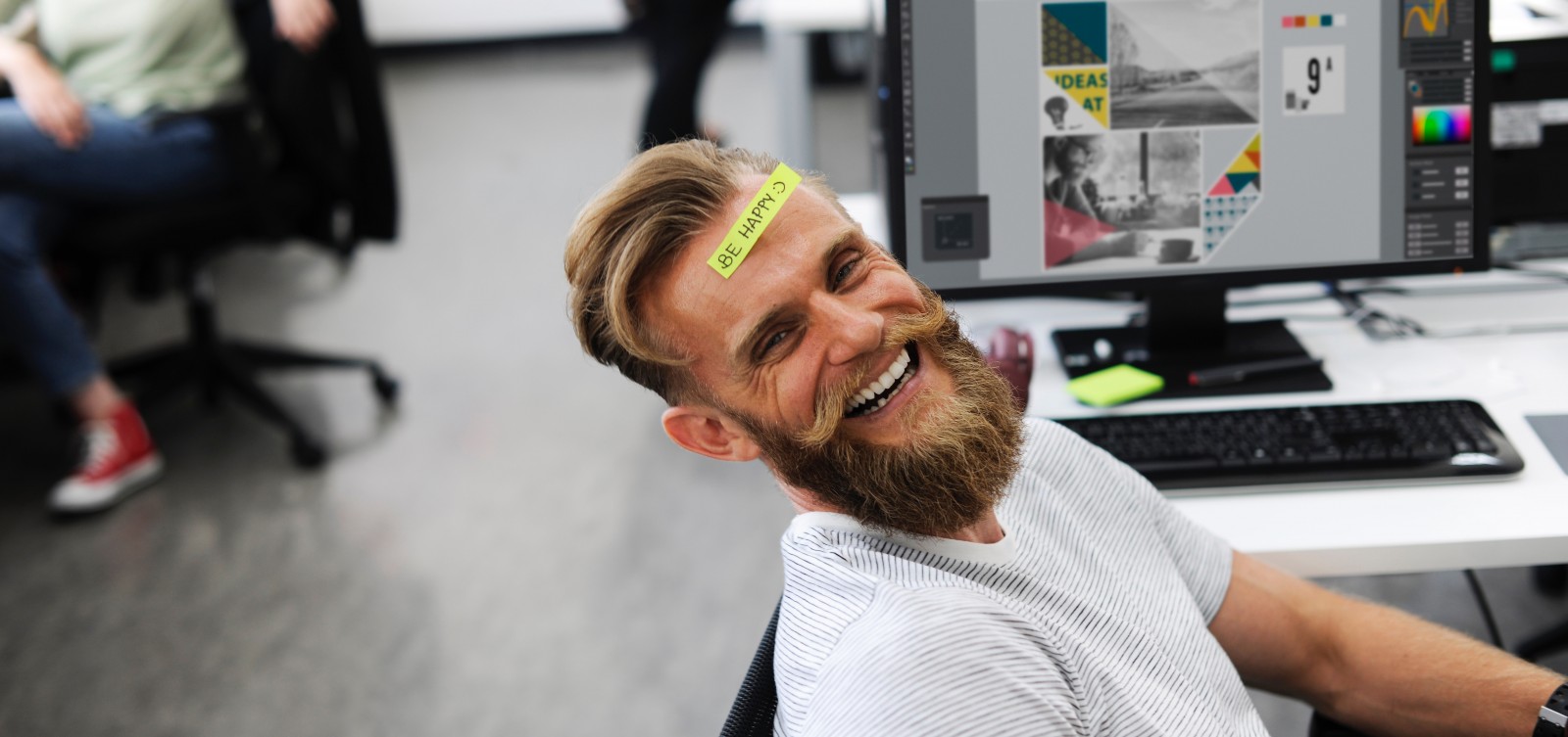 Happy Employee at Desk